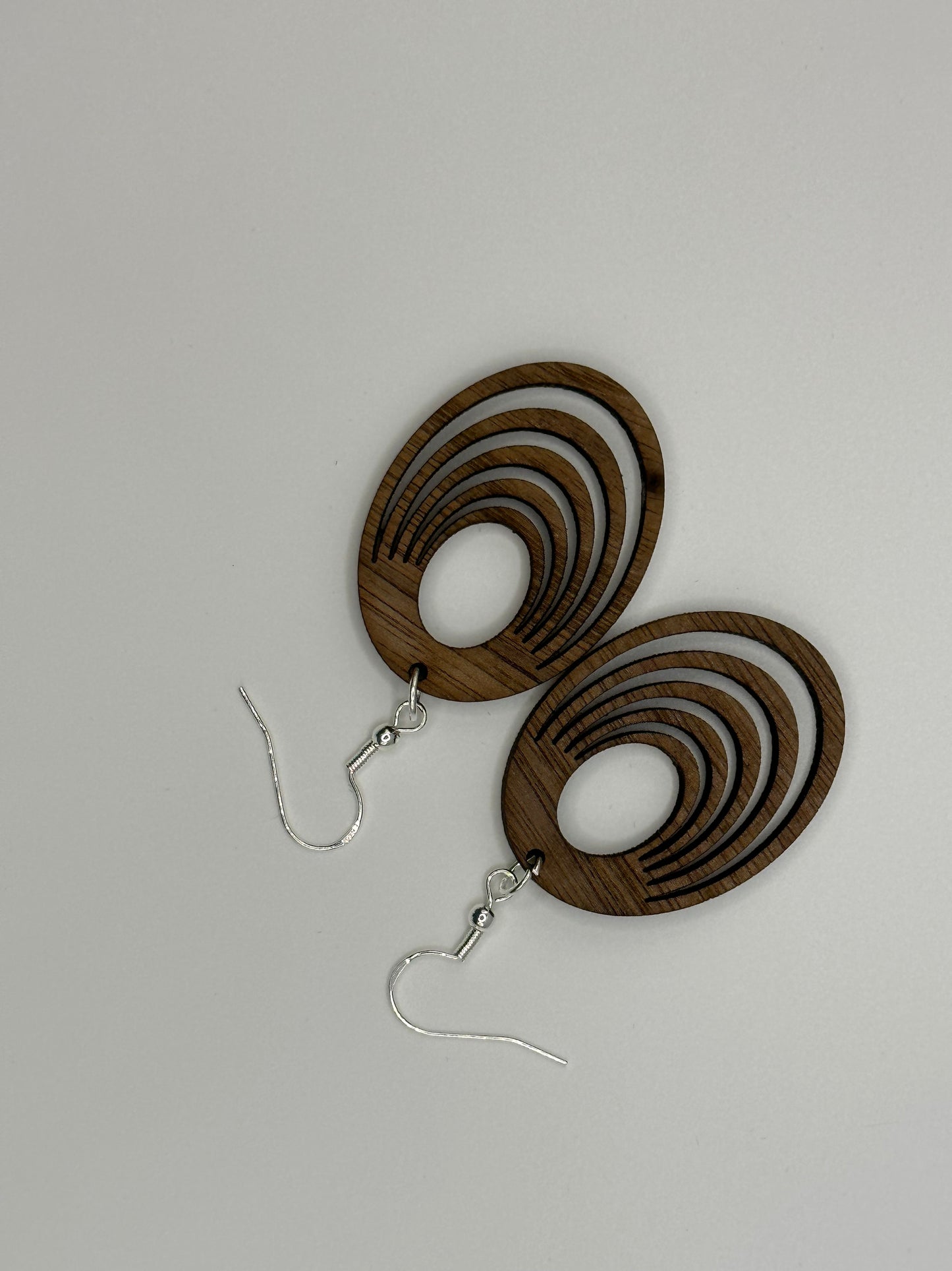 Handmade natural walnutwood earrings with 925 sterling silver French hooks.